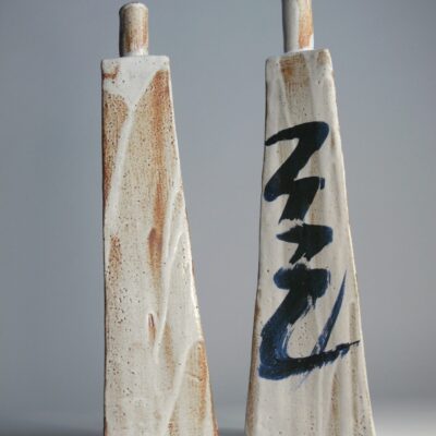Tall triangular bottles