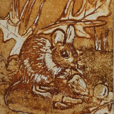 Detailed etching of a woodmouse with nuts and leaves, an Autumn feel.