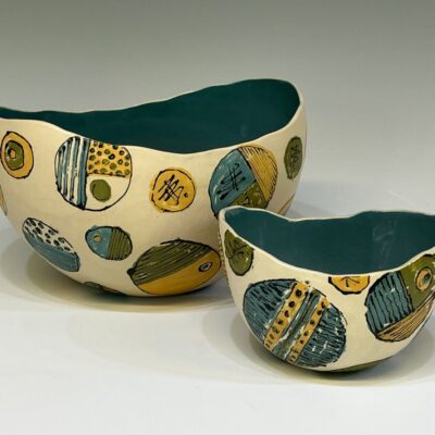 Stoneware oval bowls with printed slip designs